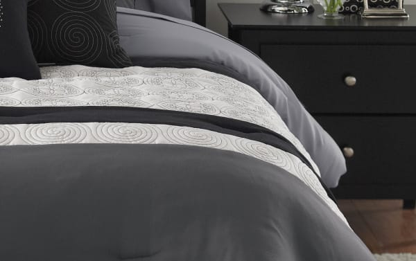 Briggs Queen Black Medallions 9 Piece Comforter Set in gray, white, and black polyester fabric with transitional style and decorative swirl patterns.