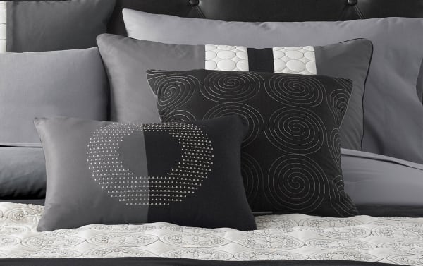 Briggs Queen Black Medallions 9 Piece Comforter Set in transitional style with gray, black, and white polyester fabric featuring spiral and medallion patterns on decorative pillows.