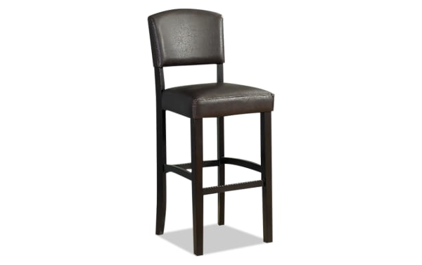 Venice Espresso faux leather upholstered counter height stool with padded vinyl seat and back, rubberwood legs, and classic tapered design.
