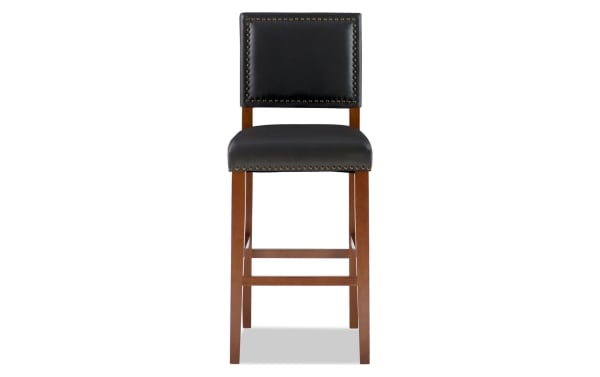 Marie Cherry & Black faux leather upholstered bar height stool with nailhead trim, rubberwood frame, and contemporary style for kitchen counters.