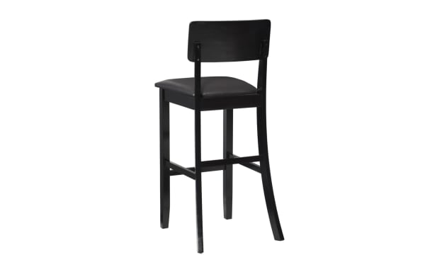 Contemporary dark brown faux leather panel back bar height stool with padded vinyl seat, rubberwood frame, and clean lines for kitchen or bar seating.