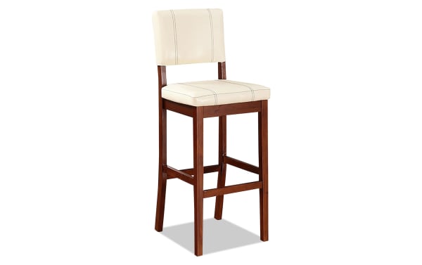 Naples Cream Faux Leather Upholstered Bar Height Stool with solid rubberwood legs, cream polyurethane seat, and transitional style.