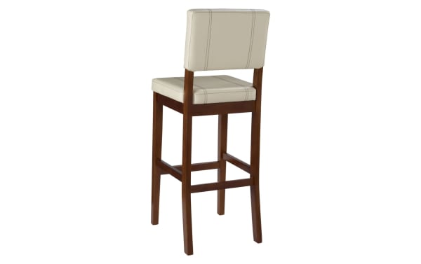 Naples Cream faux leather upholstered bar height stool with cream polyurethane cushion, solid rubberwood frame, and transitional style.