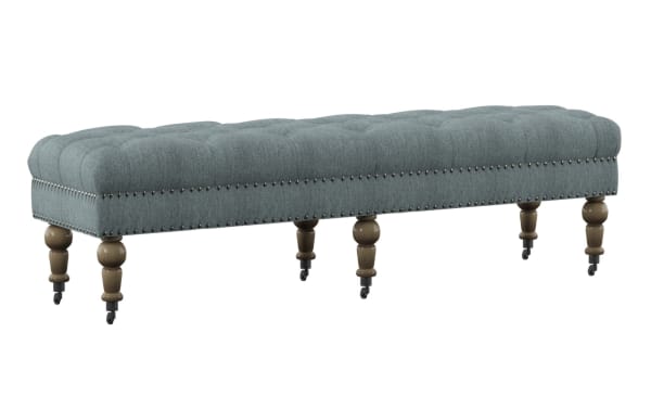 Delfina Washed Blue 62'' Bench in traditional style with washed blue linen upholstery, button tufting, silver nailhead trim, and turned wood legs.
