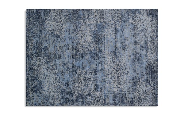 Contemporary Clay 5' x 8' Blue Abstract Rug with distressed oriental pattern in blue and gray, made of durable, stain-resistant polypropylene and acrylic.