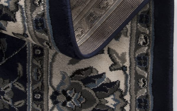 Traditional Willow 5' x 8' White Oriental Rug in blue and white with floral motifs, made of durable polypropylene for stylish, affordable luxury.