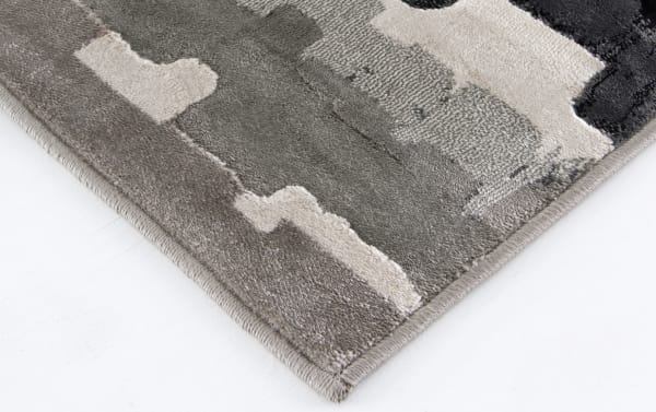 Contemporary Chantel 8' x 10' gray abstract rug with cream, charcoal, and beige tones, made of heat-set polypropylene for durability.