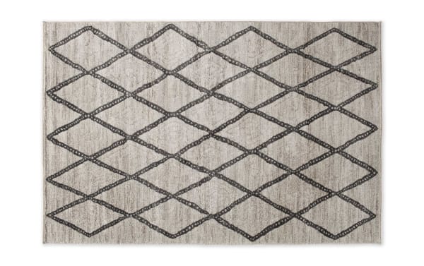 Chloe 5' x 8' White Geometric Rug in gray, ivory, and light gray with a contemporary diamond pattern. Made of soft polypropylene fibers.