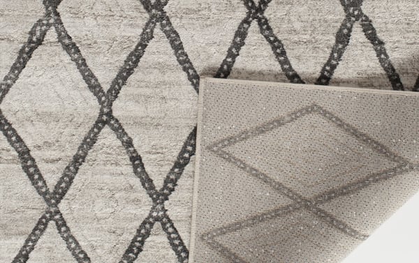 Chloe 5' x 8' White Geometric Rug in gray, ivory, and light gray with contemporary diamond pattern, made of soft polypropylene yarn for a silk-like feel.