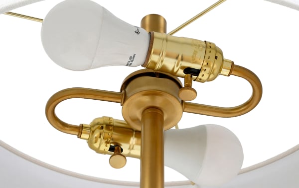 Harriet 61.5'' Brass Floor Lamp with beige linen chiffon shade, glam style, featuring sleek metal frame and dual LED bulbs with brass finish.