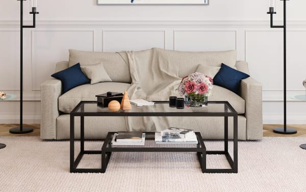 Contemporary glam Hurley Blackened Bronze Coffee Table with tempered glass top and shelf, geometric black steel frame, perfect for modern living rooms.