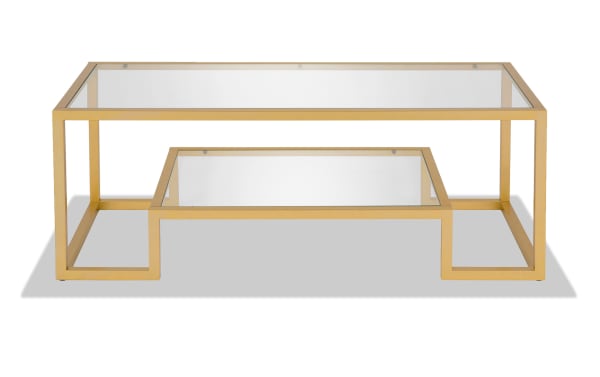 Hurley Gold Coffee Table with tempered glass top and lower shelf, gold steel geometric frame, glam style for contemporary living spaces