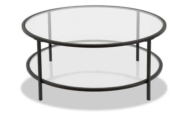 Linda Blackened Bronze Round Coffee Table from Linda collection, featuring a contemporary blackened bronze steel frame and two clear tempered glass shelves.
