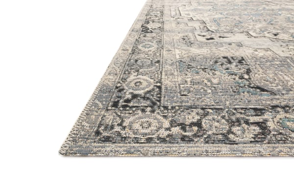 Roy 7' x 10' Gray Oriental Indoor/Outdoor Rug with traditional design, low pile polypropylene fabric, featuring gray, silver, light blue, and charcoal tones.