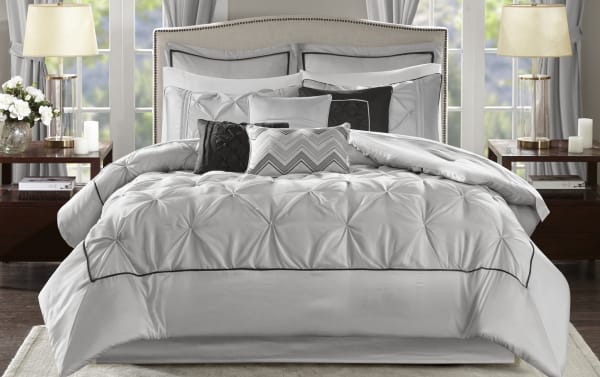 Alan Queen Gray Solid 24 Piece Comforter Set in contemporary gray polyester fabric with black and white accents, featuring tufted comforter, multiple pillows, shams, sheets, valances, and bed skirt for a complete bedroom makeover.