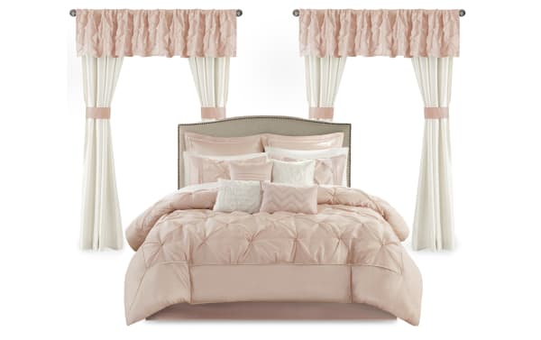Alan Queen Blush Solid 24 Piece Comforter Set in blush and white polyester fabric, featuring contemporary bedding with comforter, pillows, shams, sheets, bed skirt, and window treatments for a complete bedroom makeover.