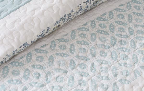 Blue vintage-style Jill Full/Queen 6 Piece Coverlet Set with quilted cotton-polyester fabric, embroidered floral pattern, and matching shams.