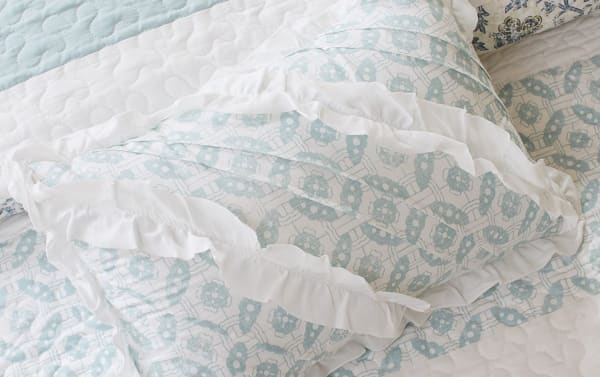 Blue vintage-style Jill Full/Queen 6 Piece Coverlet Set with quilted cotton fabric, embroidered floral pattern, ruffled edges, and matching shams and pillows.