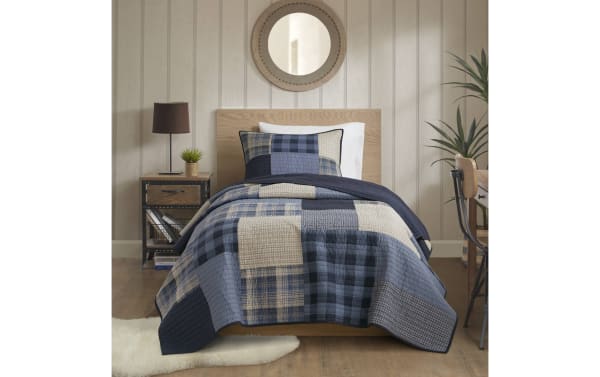 Suny Twin/Twin XL Blue Plaid 3 Piece Quilt Set with cotton rustic quilt and shams in blue, navy, and taupe plaid pattern for cozy bedrooms.