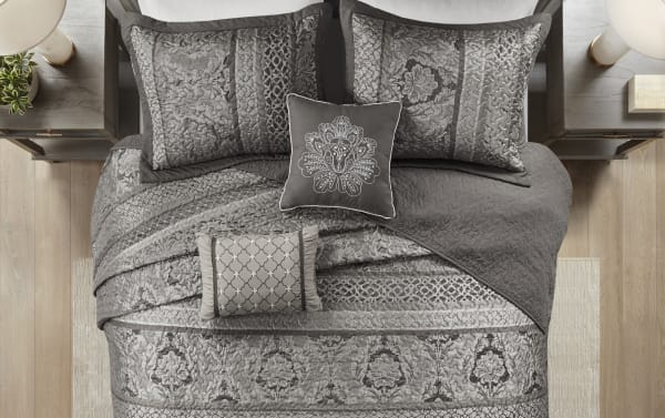Taylor Queen Gray Stripes 5 Piece Bedspread Set with traditional gray and light gray polyester-cotton fabric, includes two shams, two accent pillows, and a quilted coverlet with intricate floral and stripe patterns.