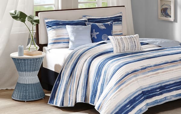Lucas Full/Queen Blue 6 Piece Coverlet Set with blue, navy, taupe, and cream stripes, cotton-polyester fabric, transitional coastal style, includes quilted pillows and shams.