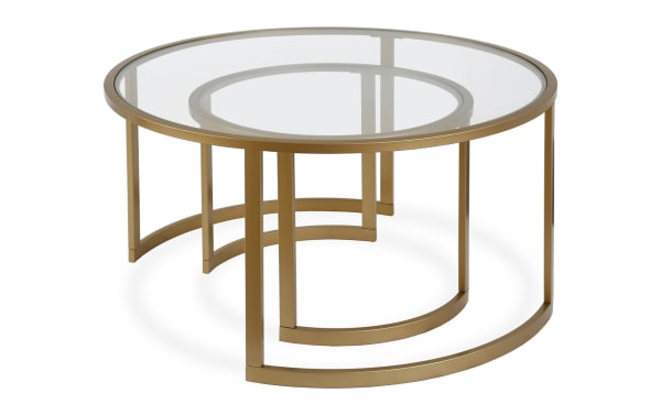 Set of 2 Adam Brass Round Nesting Coffee Tables with gold steel frames and tempered glass tops, featuring contemporary circle and semi-circle designs.