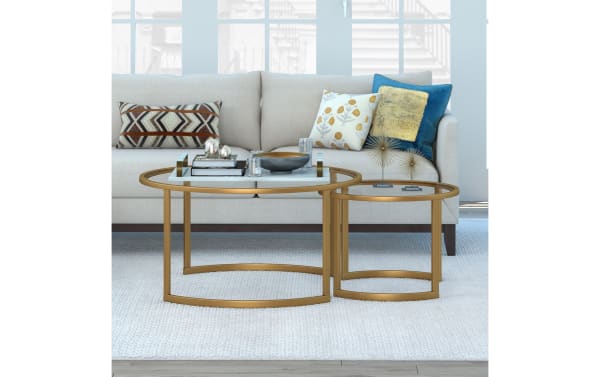 Contemporary Adam Brass Round Nesting Coffee Table set of 2 with gold steel frames, tempered glass tops, and modern circle/semi-circle design.