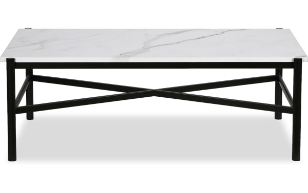 Contemporary Anora Black Coffee Table with faux marble top and black metal frame featuring geometric X-shaped support, stylish living room centerpiece.