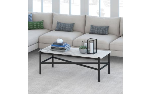 Contemporary Anora Black Coffee Table with faux marble top and black metal frame featuring geometric 'X' design, perfect for stylish living rooms.