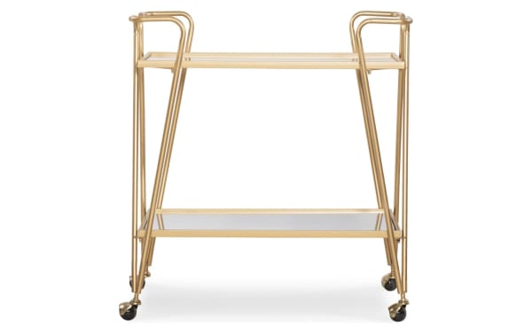 Beau Gold Bar Cart in mid-century modern style with gold steel frame and two mirrored shelves, featuring durable metal legs and caster wheels for mobility.