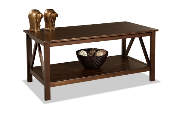 Apollo Brown Coffee Table in transitional style with warm brown pine solids and MDF, featuring geometric side design, spacious top, and lower shelf for storage. Part of the Apollo Entertainment & Occasional collection.