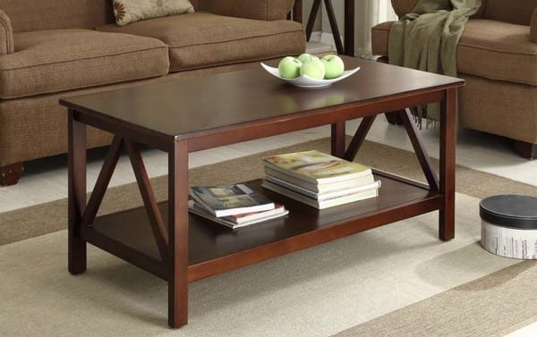 Apollo Brown Coffee Table from Apollo Entertainment & Occasional collection, transitional style with pine solids and MDF, dark wood finish, geometric side design, spacious top, and lower shelf for storage.