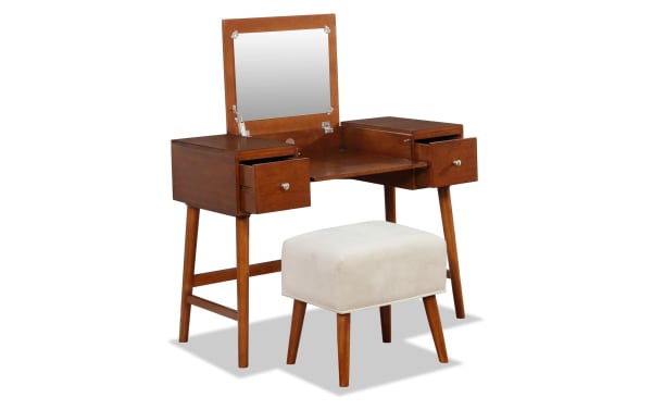 Abel Brown Lift-Top 2 Drawer Vanity Set in beige rubberwood with mid-century style, featuring a flip-top mirror, two storage drawers, and a cushioned fabric stool.