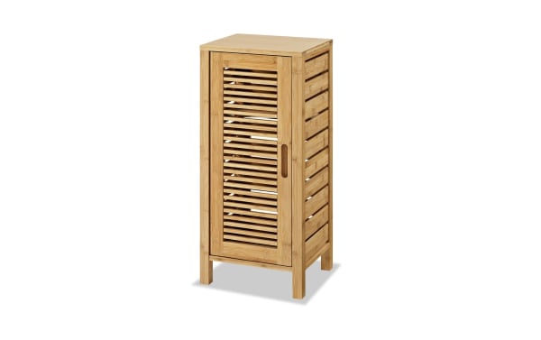 Branson Natural Floor Cabinet in transitional style, made of light bamboo with one slatted door and three interior shelves for bathroom storage.
