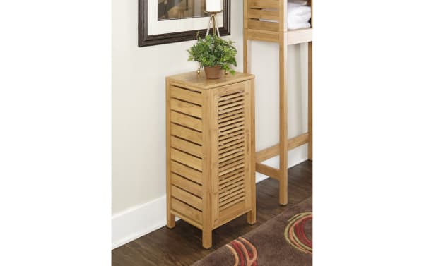 Branson Natural Floor Cabinet in bamboo with one slatted door and three interior shelves, transitional style for bathroom storage.