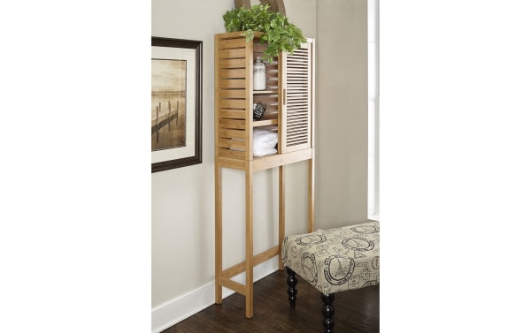 Branson Natural Over the Toilet Space Saver Cabinet in bamboo with a transitional style, featuring two sliding louvered doors and three interior shelves for compact bathroom storage.