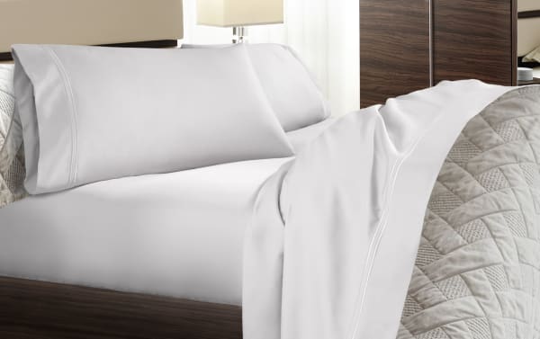 MyBob's Full White Solid Premium Modal 4 Piece Sheet Set with smooth, traditional sateen weave, fitted sheet with elastic cuff, and enveloping pillowcases.