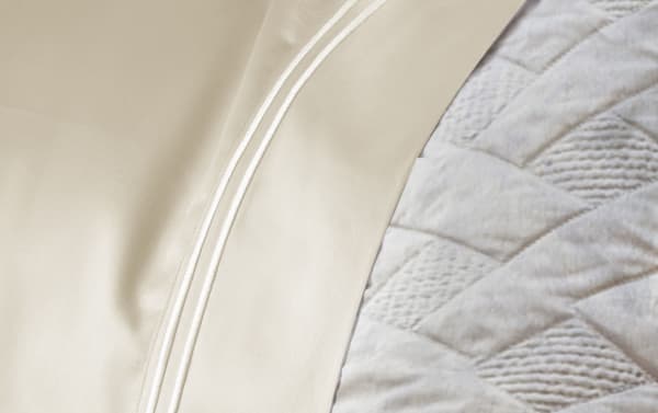 MyBob's Full White Solid Premium Modal 4 Piece Sheet Set with smooth, traditional white modal-cotton blend fabric and deep pockets for mattresses up to 18 inches.