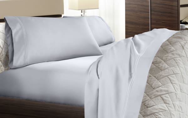 Queen blue solid premium modal sheet set by MyBob, featuring smooth sateen weave cotton-modal blend, elastic fitted sheet, deep pockets, and enveloping pillowcases.
