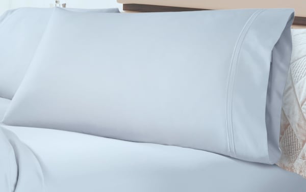 Light blue MyBob's Split Head Queen sheet set with smooth, sateen-woven modal and cotton blend pillowcases, featuring traditional style and deep pockets.