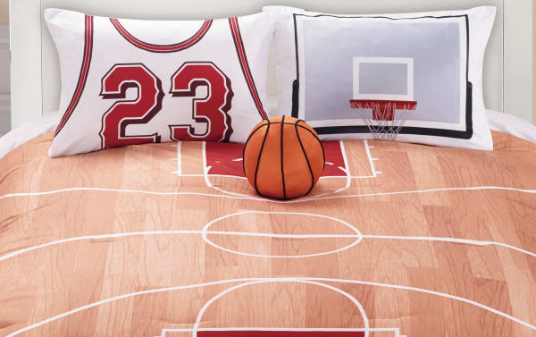 Transitional Ball Twin Orange Novelty Reversible 3 Piece Comforter Set in polyester fabric features a basketball court and ball design with coordinating jersey and hoop pillow shams.