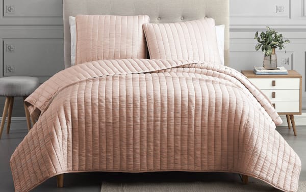 Moon Queen Blush Striped 3 Piece Comforter Set in blush pink polyester fabric with crinkle texture and elongated stitched lines, transitional style.