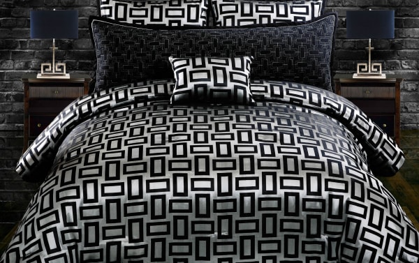 Kali Queen Black Geometric 5 Piece Comforter Set in black and silver polyester fabric, featuring a modern transitional style with bold geometric patterns for a dramatic bedroom makeover.