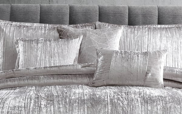 Zoey Queen Silver Solid 7 Piece Comforter Set with crinkled velvet polyester fabric, including comforter, shams, bedskirt, and accent pillows in a modern transitional style.