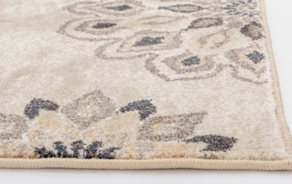 Beige Anna 5' x 7' floral rug with ivory and gray accents, transitional style, made of stain-resistant polypropylene for durable home decor.