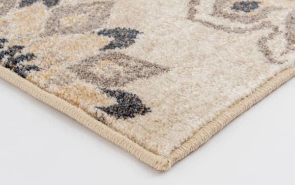 Beige and ivory Anna 5' x 7' floral rug with gray accents, transitional style, made of stain-resistant polypropylene for durable floor decor.