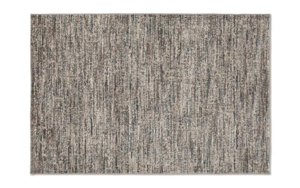Transitional Alana 5' x 7' gray abstract rug with gray, brown, and beige tones, made of stain-resistant polypropylene for modern and traditional spaces.
