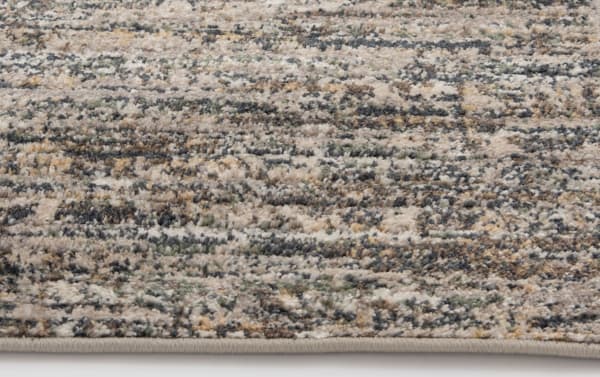 Transitional Alana 5' x 7' gray abstract rug with beige and brown tones, made of durable, stain-resistant polypropylene fibers.