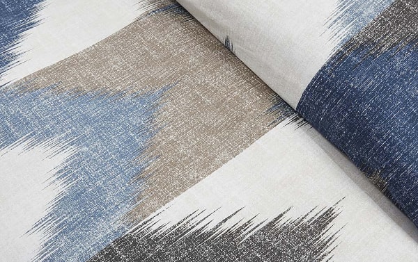 Moira King California King 3-piece cotton comforter set in navy, denim, gray, white, and gold with mid-century modern broken chevron pattern and duvet-like finish.