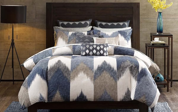 Moira King California King 3-piece cotton comforter set in denim, gray, white, and gold with a modern broken chevron pattern and matching shams.